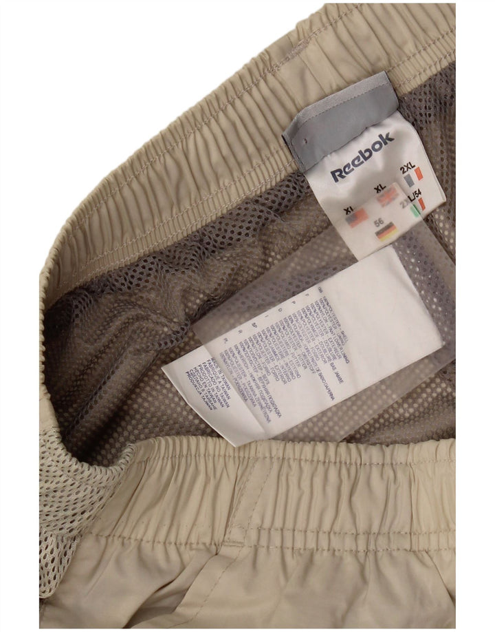 Pantaloni da tuta da uomo Reebok XL Beige Poliestere
