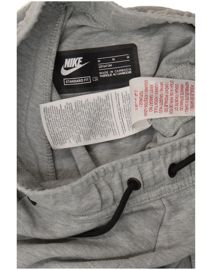 Pantaloni da tuta da ragazzo Nike Joggers 10-11 anni Grigio medio chiazzato