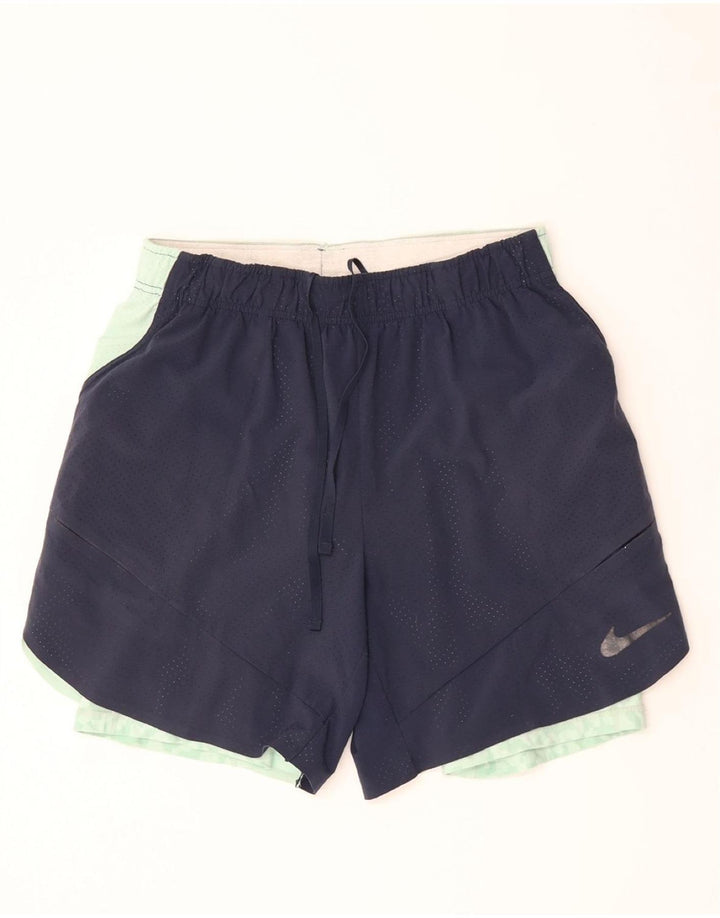 NIKE Womens Skort UK 16 Large  Navy Blue Colourblock Polyester Vintage Nike and Second-Hand Nike from Messina Hembry 
