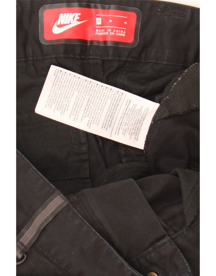 Pantaloni cargo affusolati Nike da uomo medi W32 L29 cotone nero