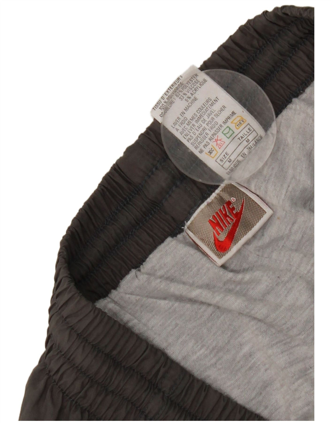 Pantaloni da tuta da uomo Nike Joggers in nylon grigio medio