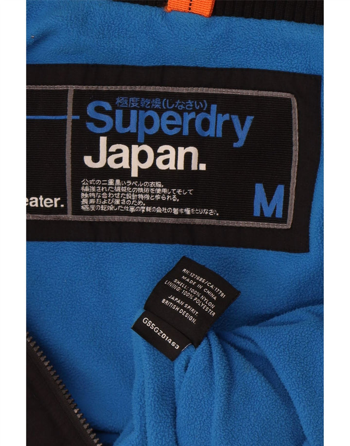 Giacca a vento grafica da donna Superdry UK 14 media nera