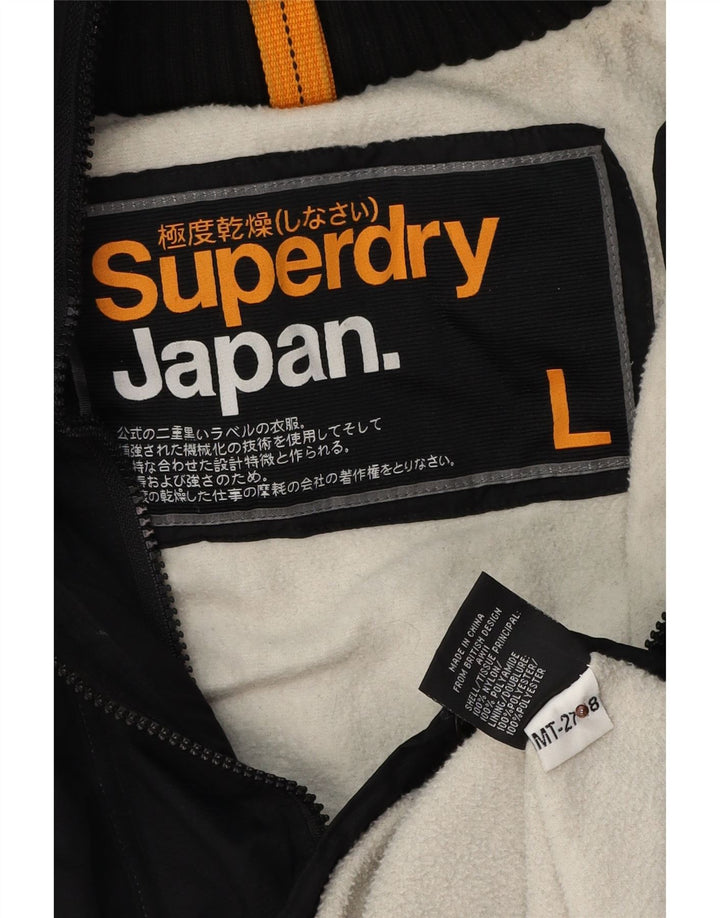 Giacca a vento con cappuccio grafica da donna Superdry UK 16 grande nylon nero