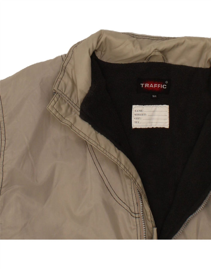 VINTAGE Boys Oversized Windbreaker Jacket 13-14 Years Beige Nylon Vintage Vintage and Second-Hand Vintage from Messina Hembry 
