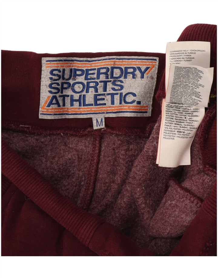 Pantaloni da tuta con grafica da uomo Superdry Color block bordeaux medio