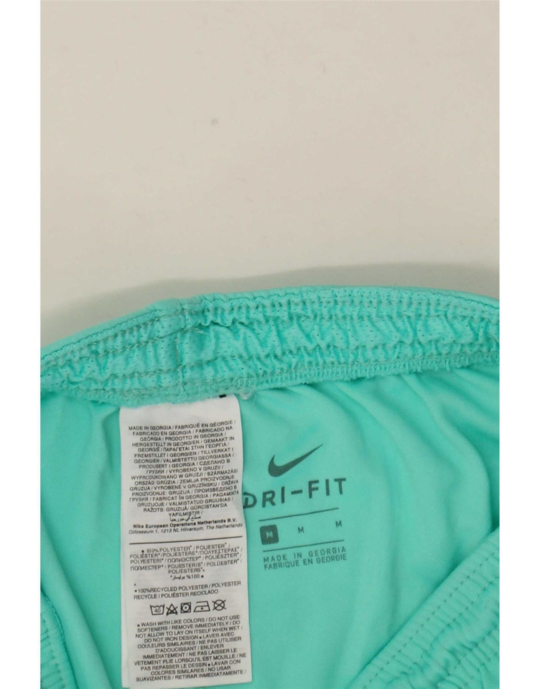 Pantaloncini sportivi Nike Dri Fit da uomo in poliestere turchese medio