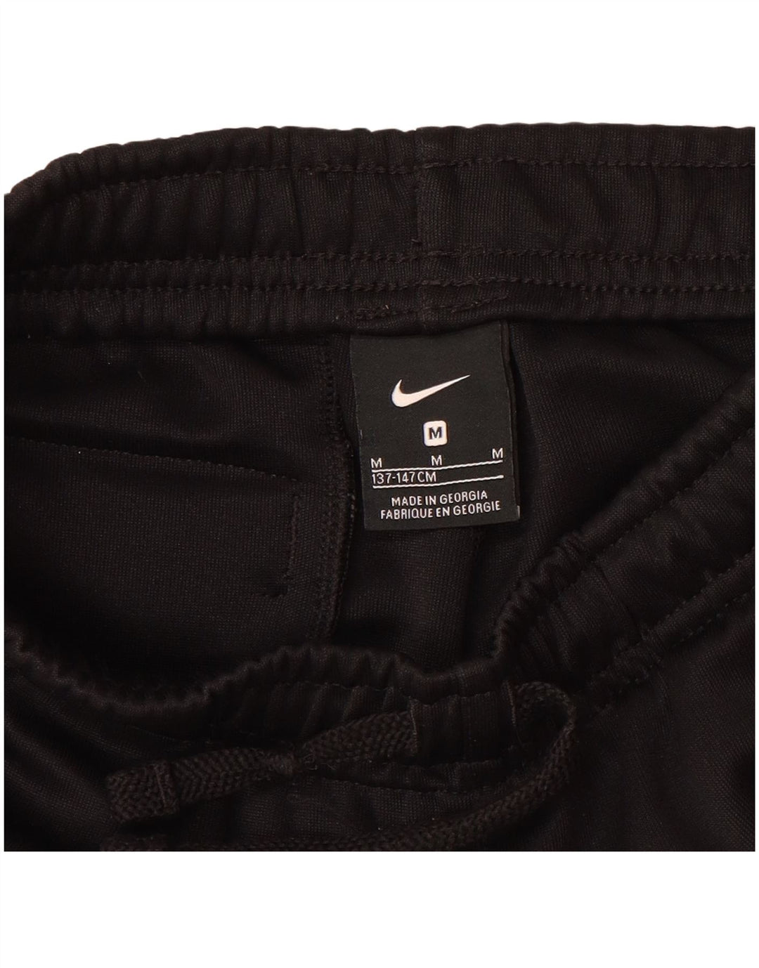 NIKE Boys Graphic Tracksuit Trousers Joggers 10-11 Years Medium  Black