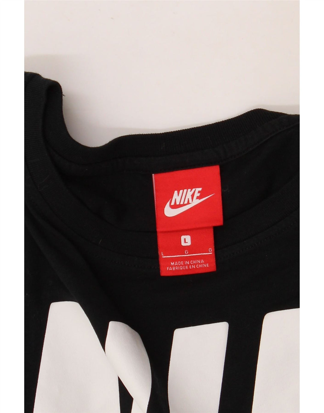 T-shirt grafica da donna Nike Top UK 16 grande nera