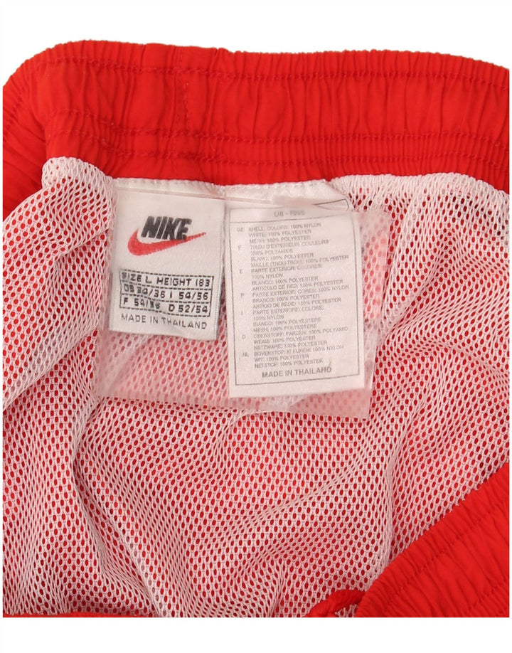 Pantaloncini sportivi Nike da uomo con grafica grande, nylon color block rosso