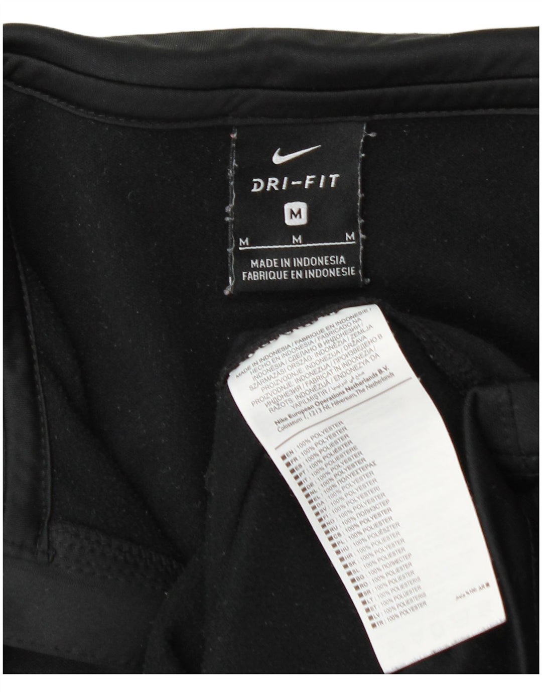 Top della tuta da ginnastica Nike Dri Fit con collo e zip da uomo, poliestere nero medio