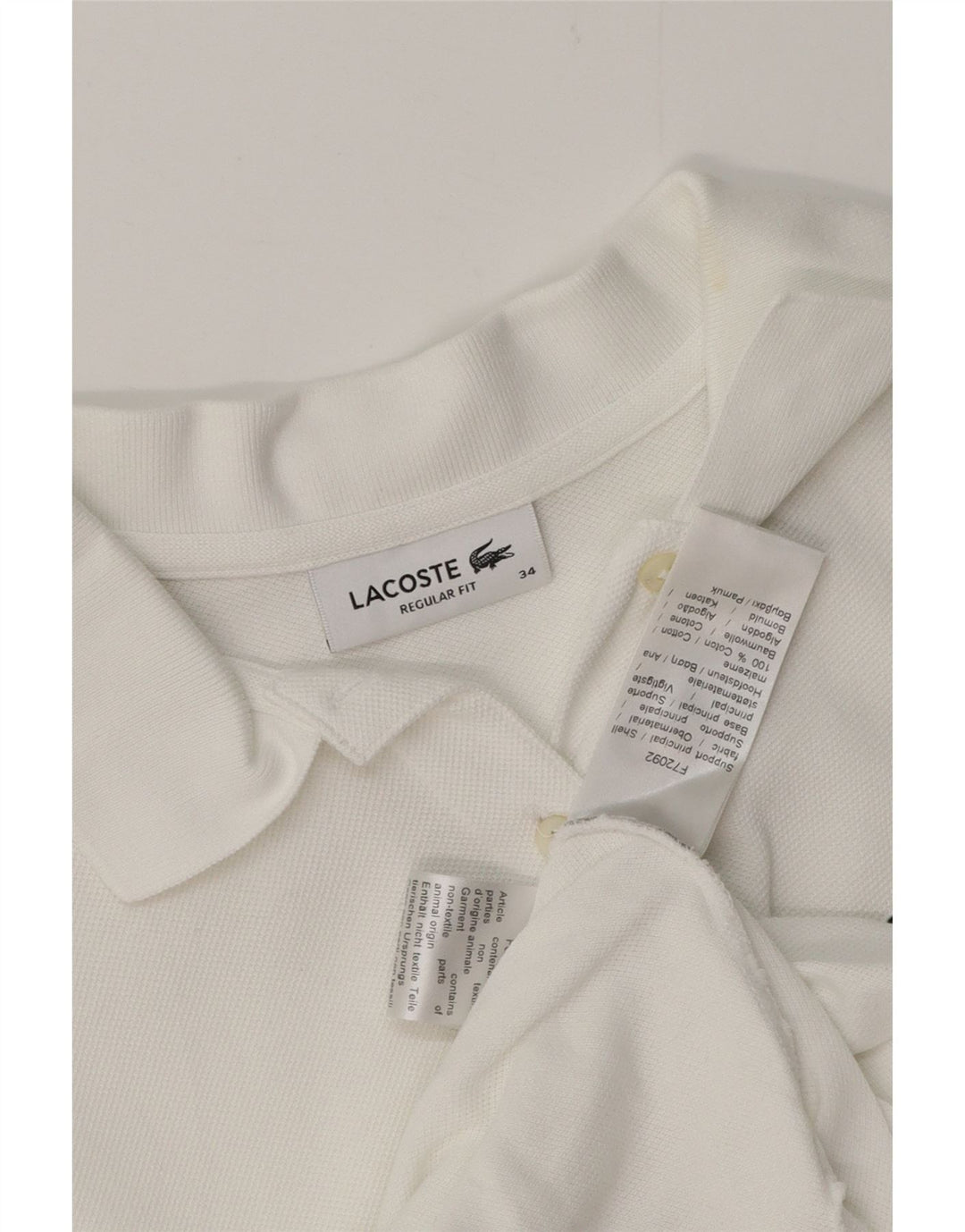 Polo LACOSTE da donna vestibilità regolare taglia 34 piccola in cotone bianco