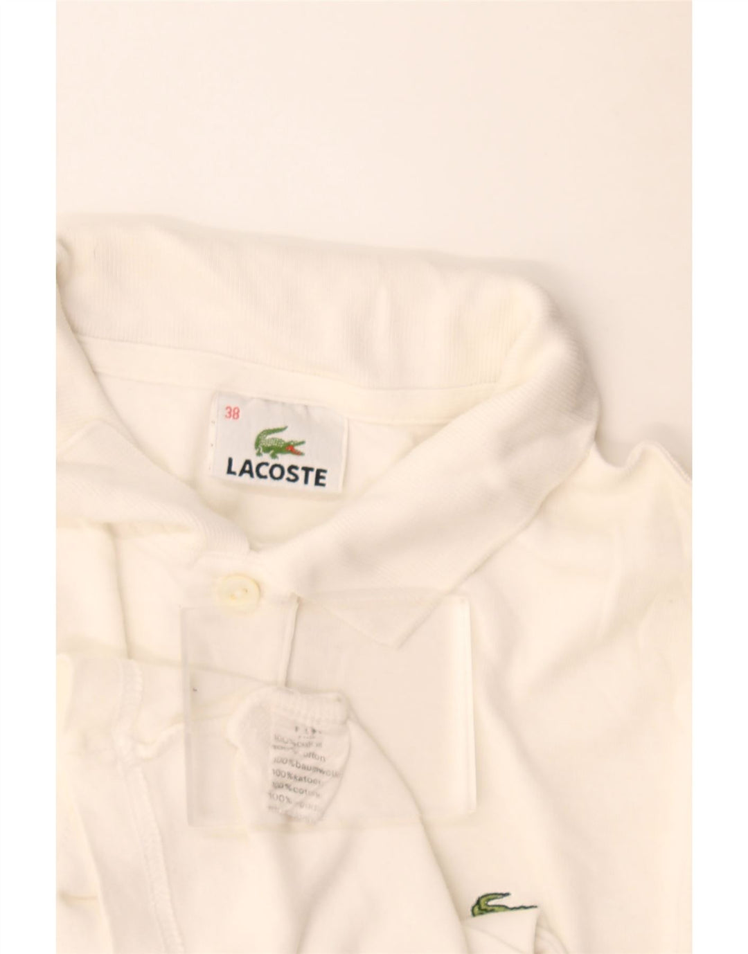 Polo da donna Lacoste taglia 38 media in cotone bianco sporco