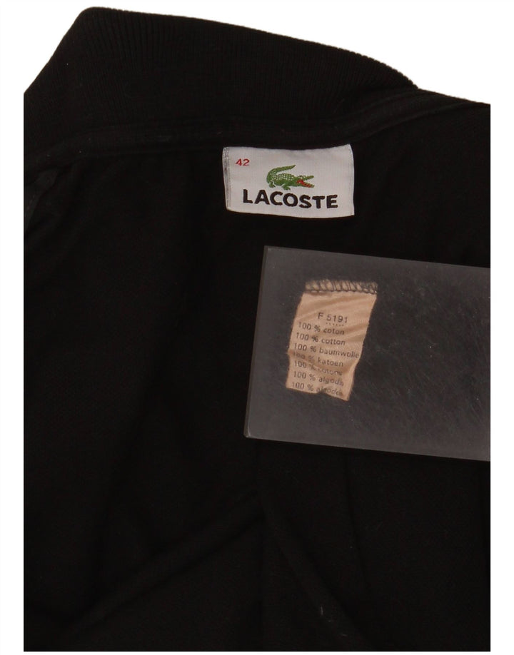 Polo da donna Lacoste taglia 42 grande in cotone nero