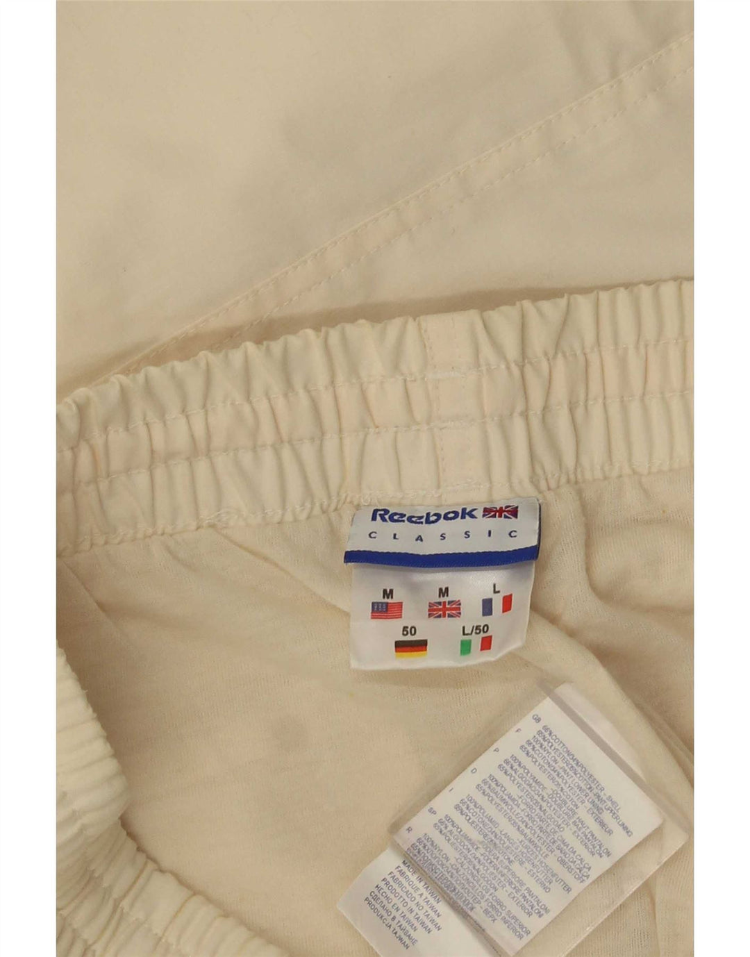 Pantaloncini sportivi Reebok da uomo, bermuda, cotone beige medio