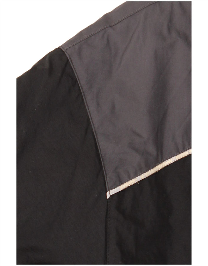 Giacca a vento Nike da ragazzo 13-14 anni XL in nylon color block nero