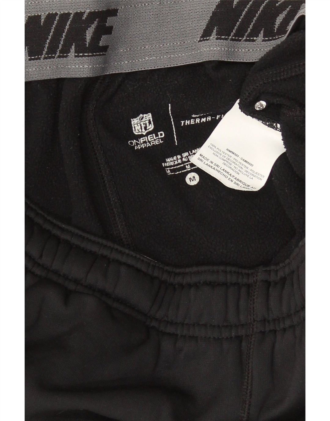 Pantaloni da tuta Nike Therma-Fit da uomo in poliestere nero medio