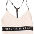 Reggiseno sportivo Nike da donna con grafica, top piccolo, in poliestere bianco sporco