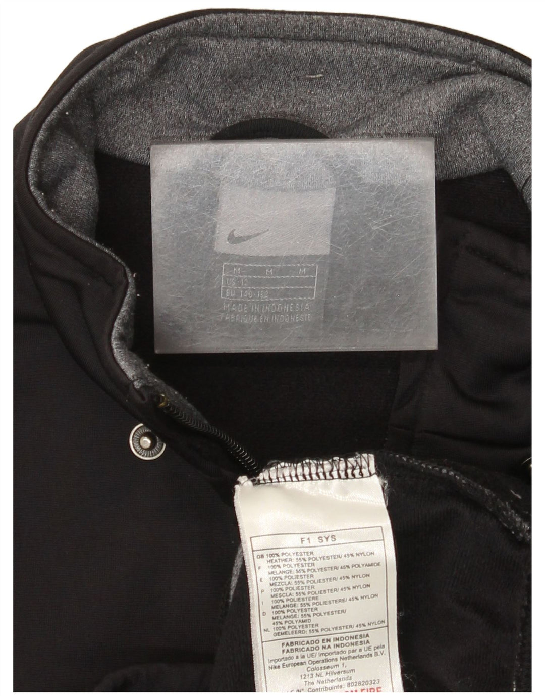 Giacca superiore della tuta da ragazzo Nike 10-11 anni blocco colore nero medio