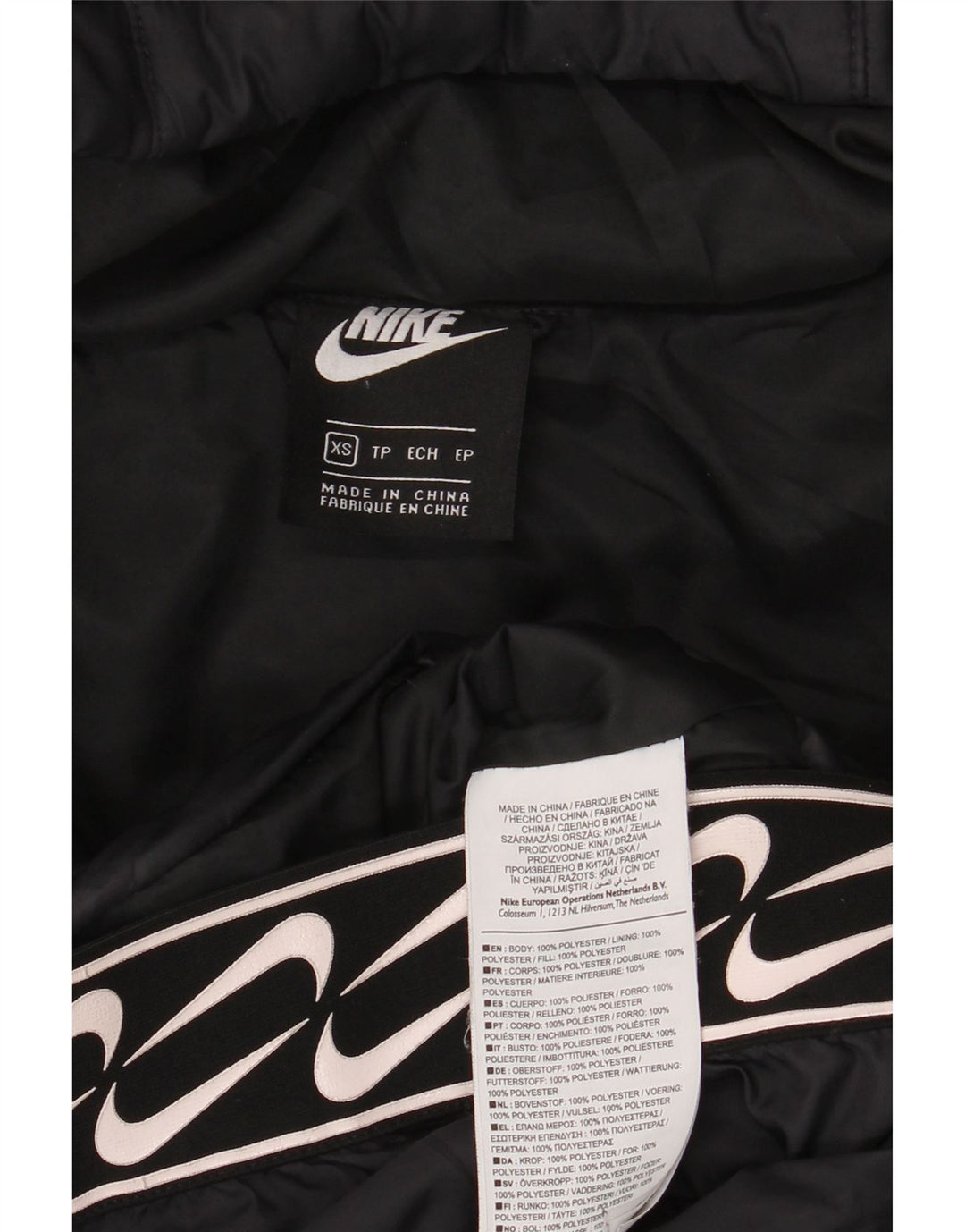 Giacca imbottita con cappuccio grafico Nike da donna UK 6 XS poliestere nero