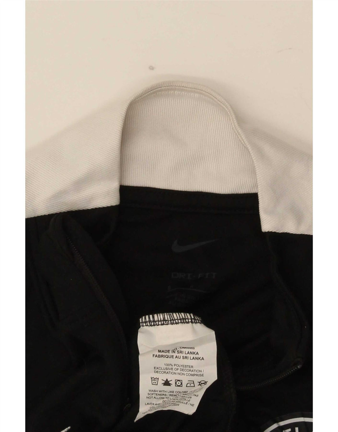 Top da tuta Nike da uomo con grafica pullover con zip e collo piccolo color block nero