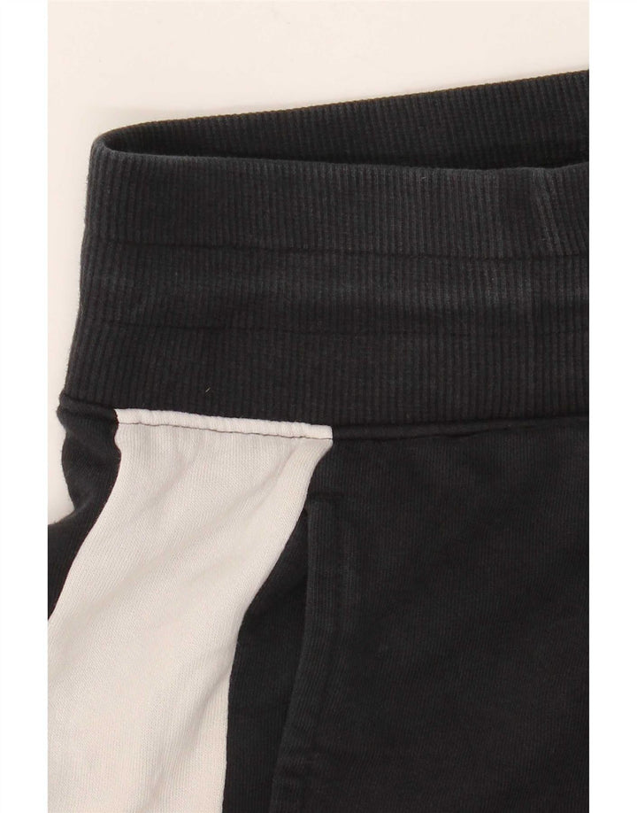 Pantaloni da tuta da donna Puma Joggers UK 12 Medium Black Colourblock