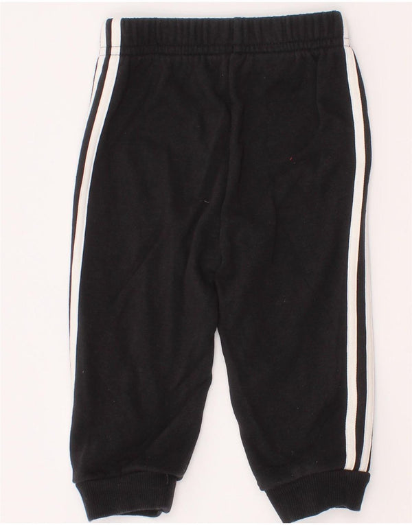 Pantaloni da tuta Adidas da bambino Manchester United 6-9 mesi neri