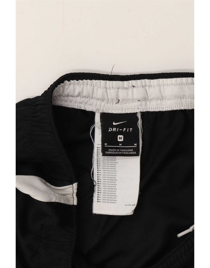 Pantaloni da tuta Nike Dri Fit da uomo in poliestere color block medio nero