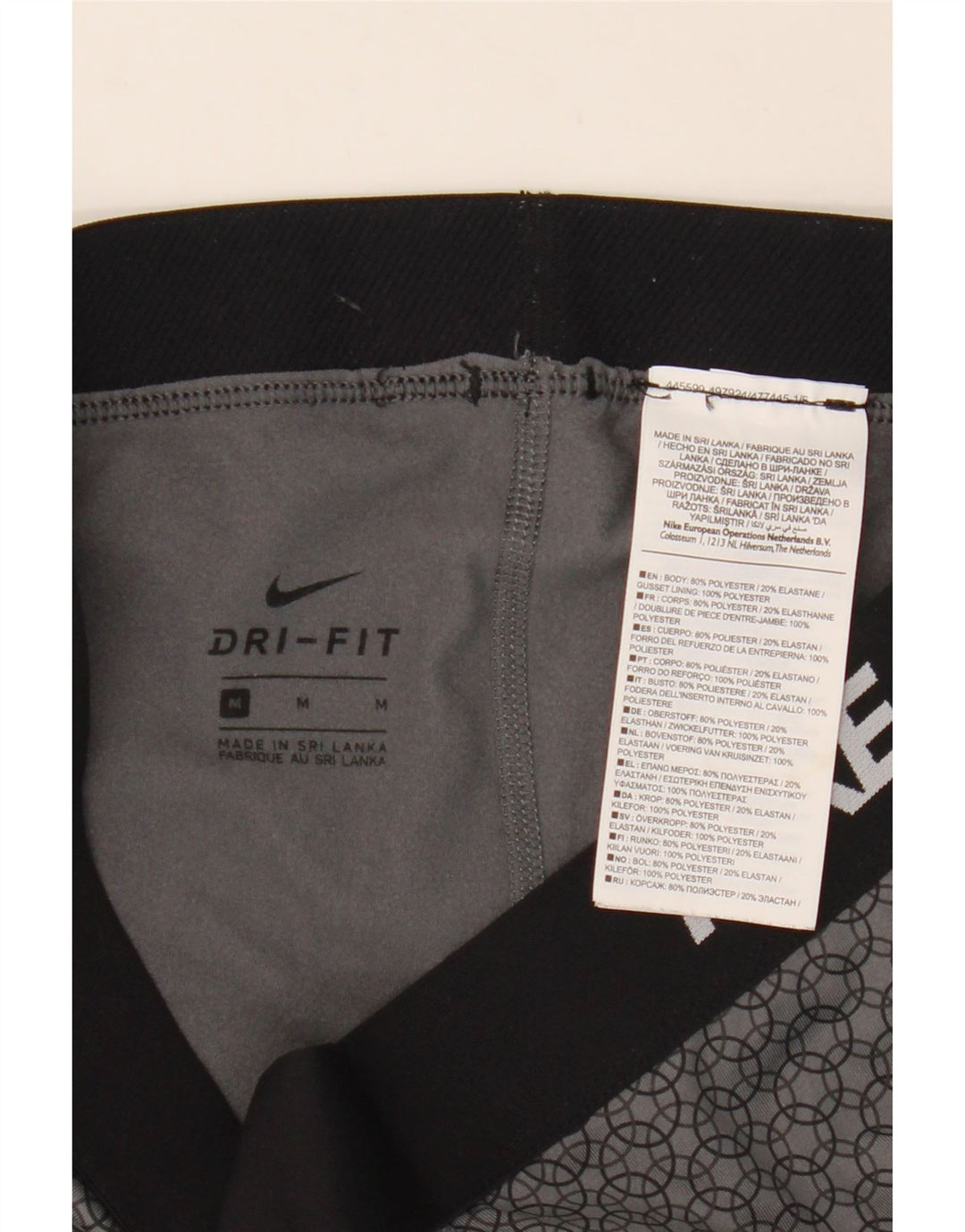 Leggings grafici Nike Dri Fit da donna UK 12 Poliestere geometrico grigio medio