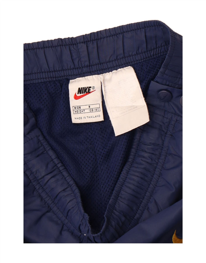 NIKE Boys Tracksuit Trousers 8-9 Years Small Navy Blue Polyester Vintage Nike and Second-Hand Nike from Messina Hembry 