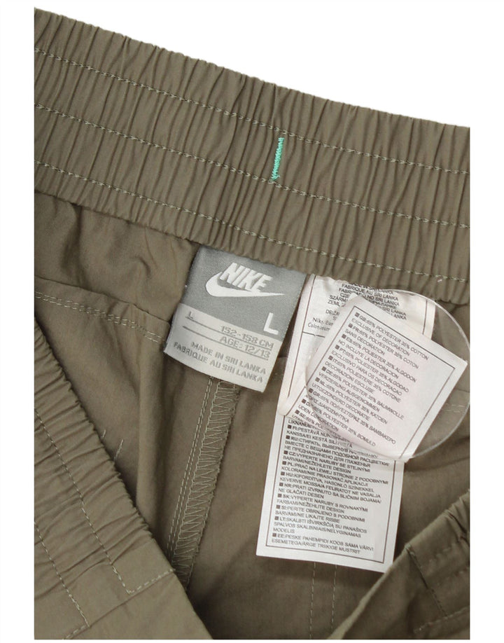 Pantaloncini casual Nike da bambino 12-13 anni Large W28 poliestere kaki