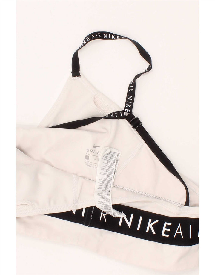 Reggiseno sportivo Nike da donna con grafica, top piccolo, in poliestere bianco sporco