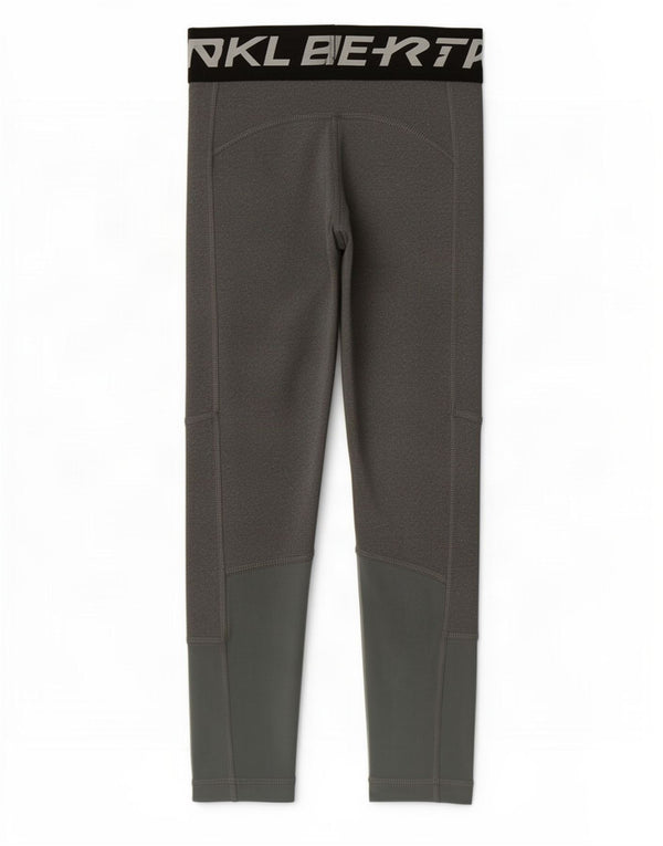 Leggings Nike Dri Fit Graphic per ragazze 8-9 anni Small Grey Colourblock