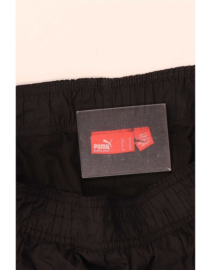Pantaloni impermeabili Puma da donna UK 12 medi neri