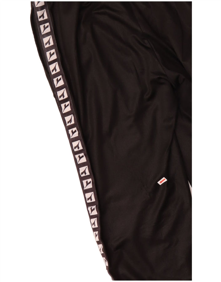 Tuta intera DIADORA da donna con grafica oversize UK 10 piccola nera