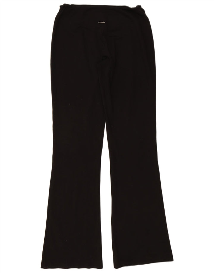 Pantaloni da tuta svasati da donna Puma UK 14 Large neri