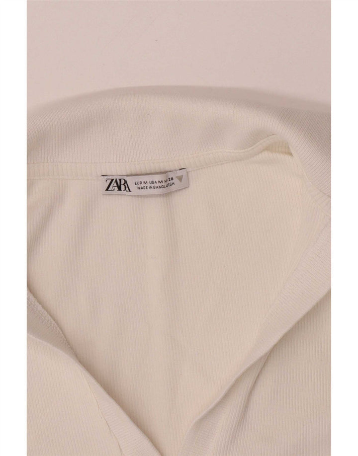 Polo corta da donna Zara UK 12 bianca media
