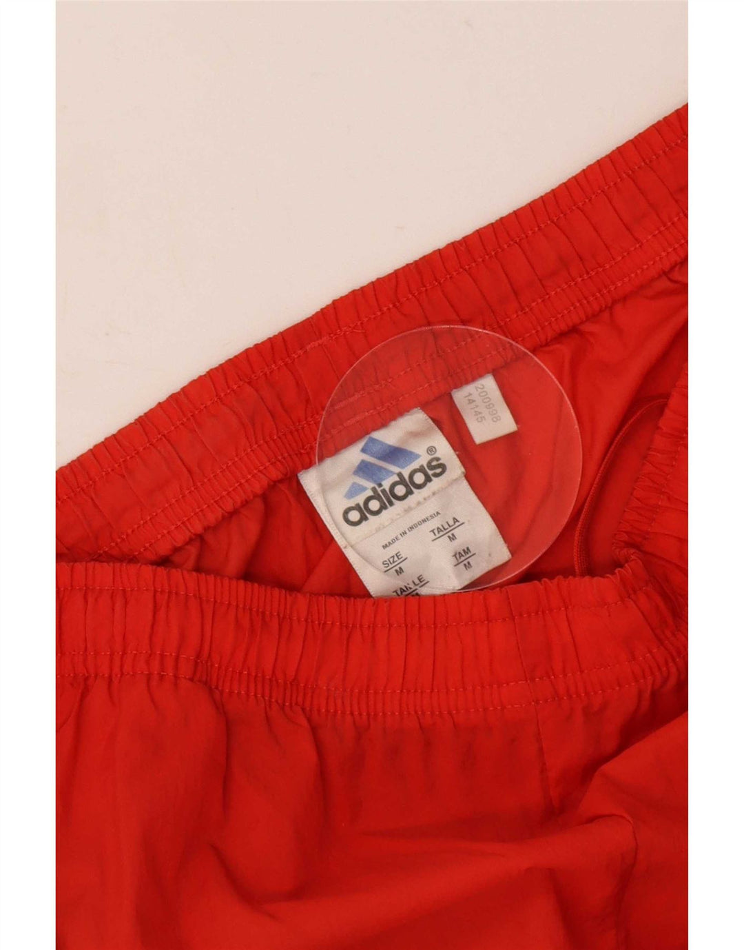 Pantaloni da tuta Adidas da uomo in nylon rosso medio