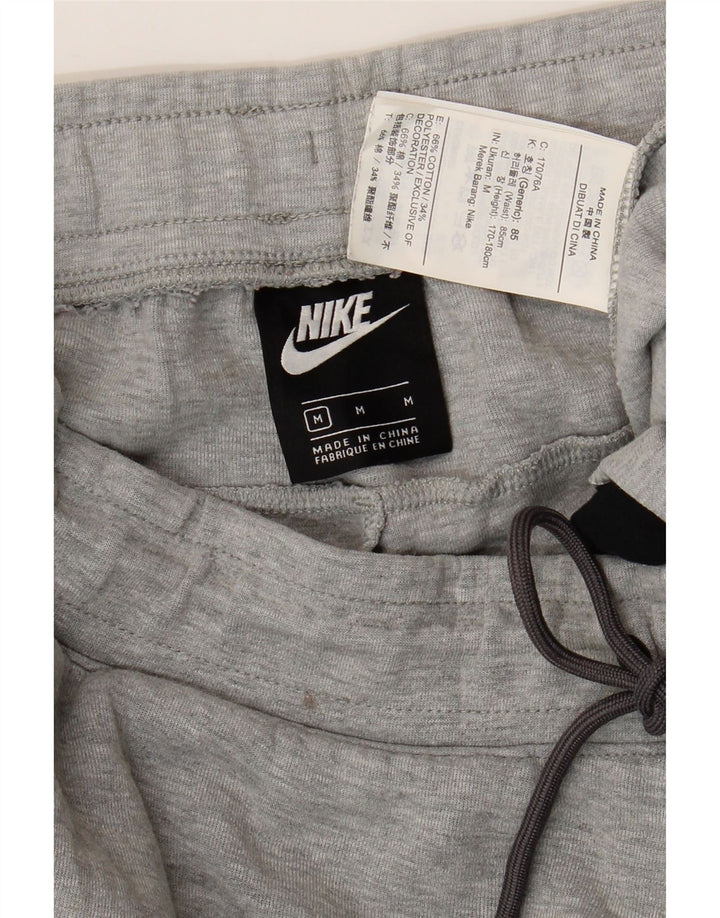 Pantaloni da tuta da uomo Nike Joggers in cotone color block grigio medio