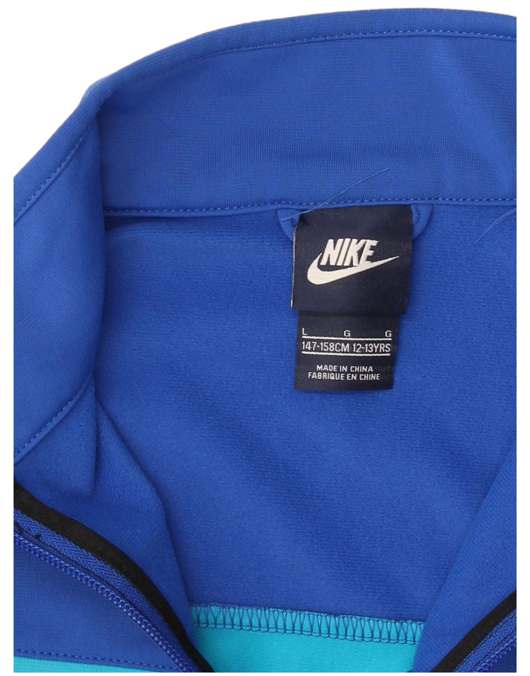 Giacca superiore della tuta da ragazzo Nike 12-13 anni Large Black Colourblock