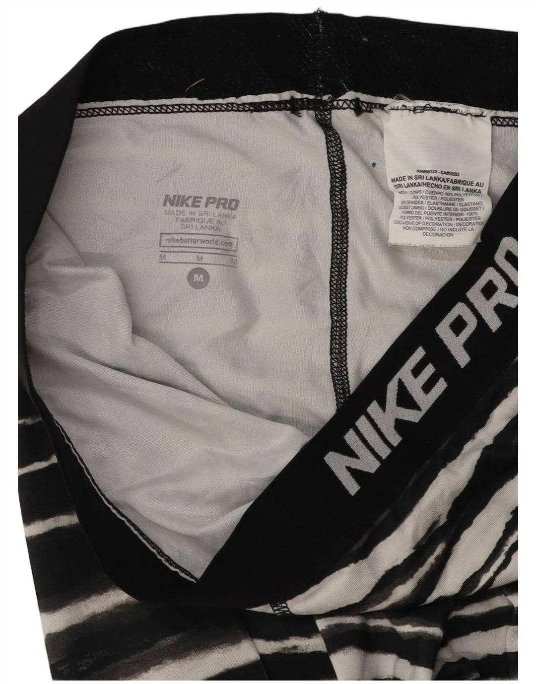 Pantaloni da tuta Nike Graphic Capri da donna UK 12 medi a righe nere