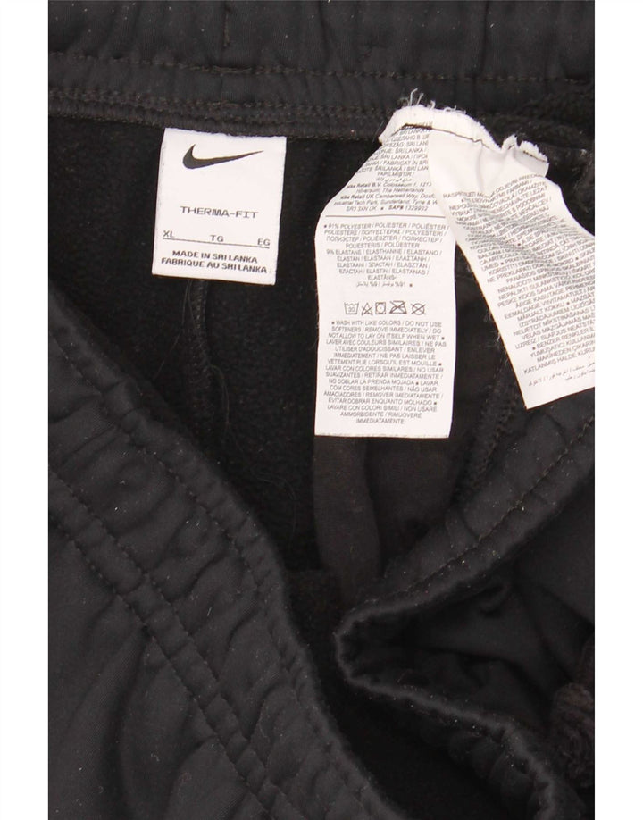 Pantaloni da tuta grafica Nike Therma-Fit da uomo XL poliestere nero