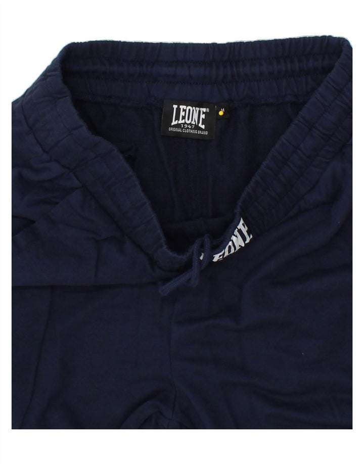 VINTAGE Mens Graphic Tracksuit Trousers Joggers Medium  Navy Blue Cotton Vintage Vintage and Second-Hand Vintage from Messina Hembry 