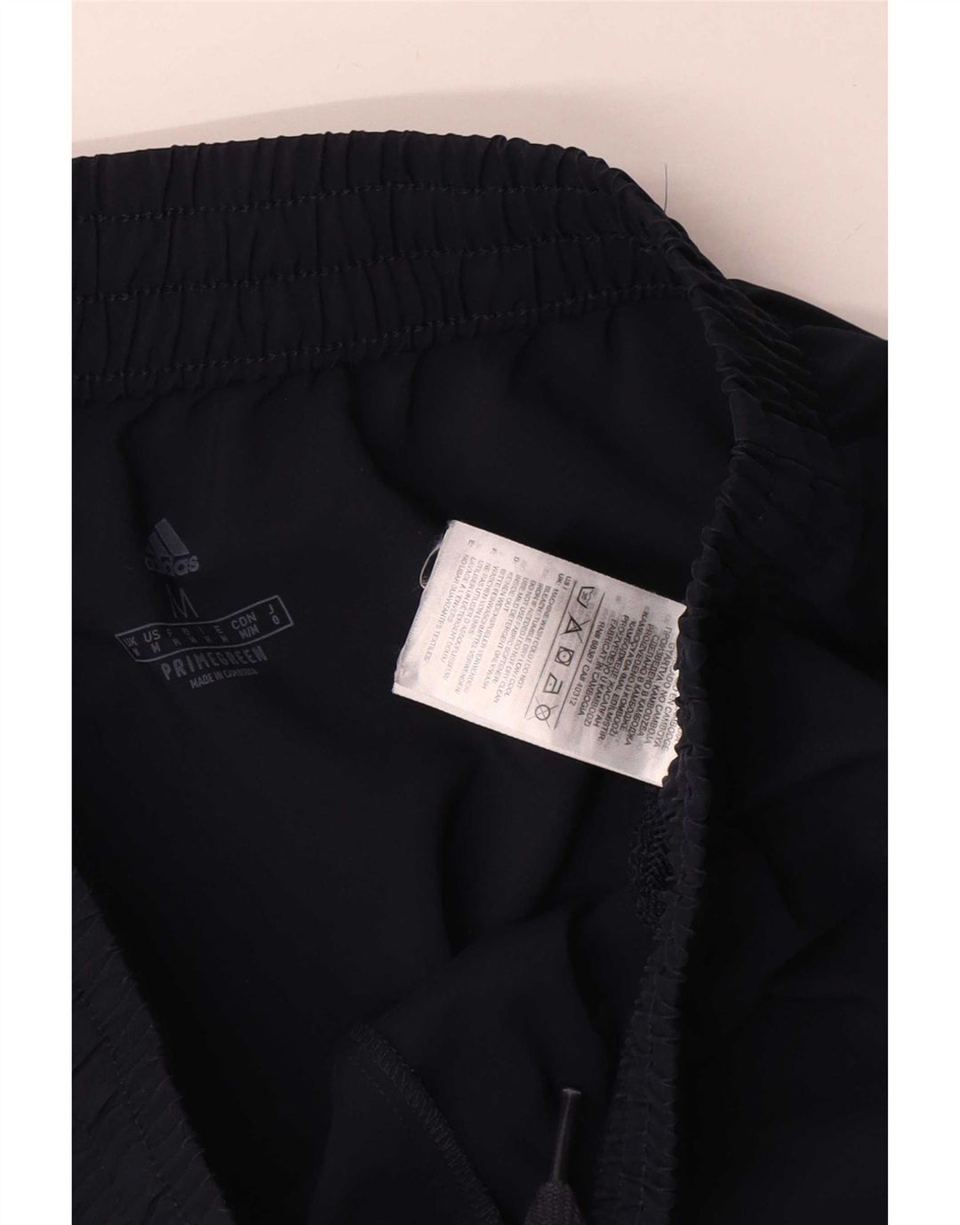 Pantaloni da tuta da uomo Adidas medi in poliestere blu navy