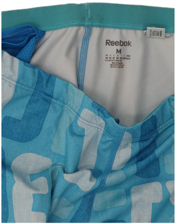 Pantaloni da tuta con grafica REEBOK da donna UK 12 Colorblock blu medio