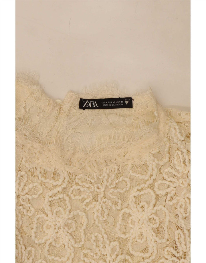Top corto in camicetta di pizzo da donna Zara UK 12 Beige medio floreale