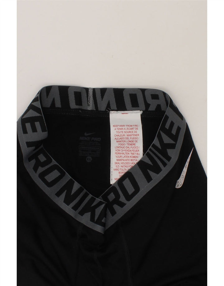NIKE Boys Graphic Leggings 13-14 Years XL Black Polyester Vintage Nike and Second-Hand Nike from Messina Hembry 