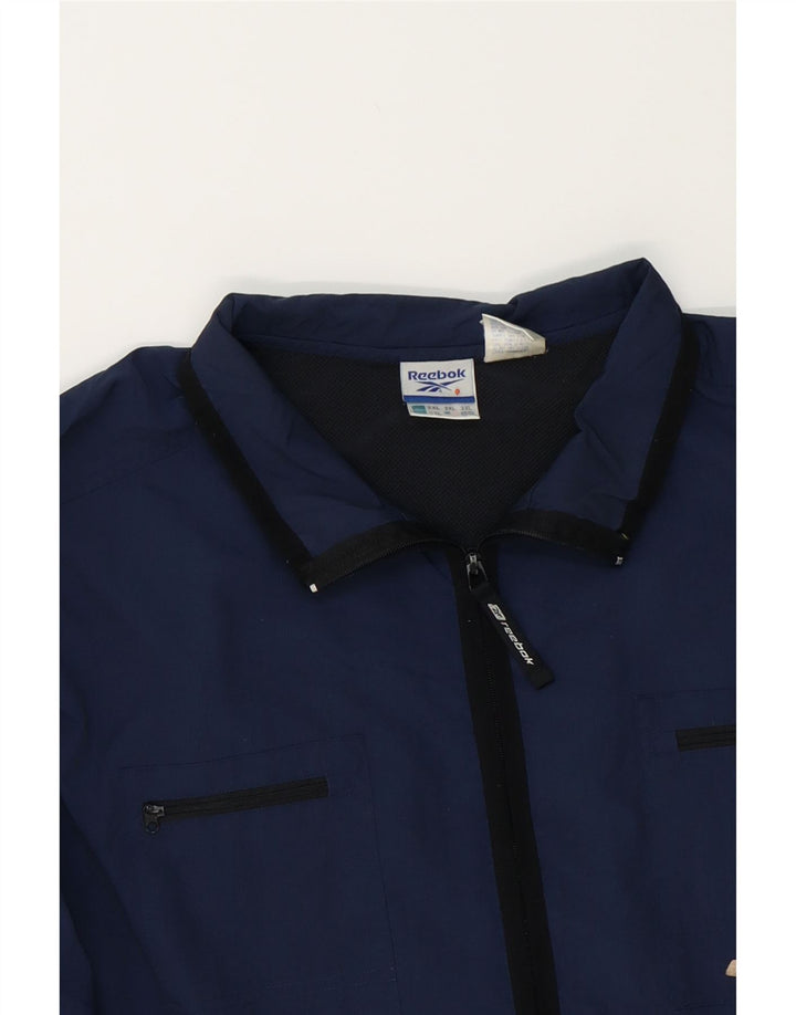 REEBOK Mens Tracksuit Top Jacket 2XL Navy Blue Polyamide Vintage Reebok and Second-Hand Reebok from Messina Hembry 