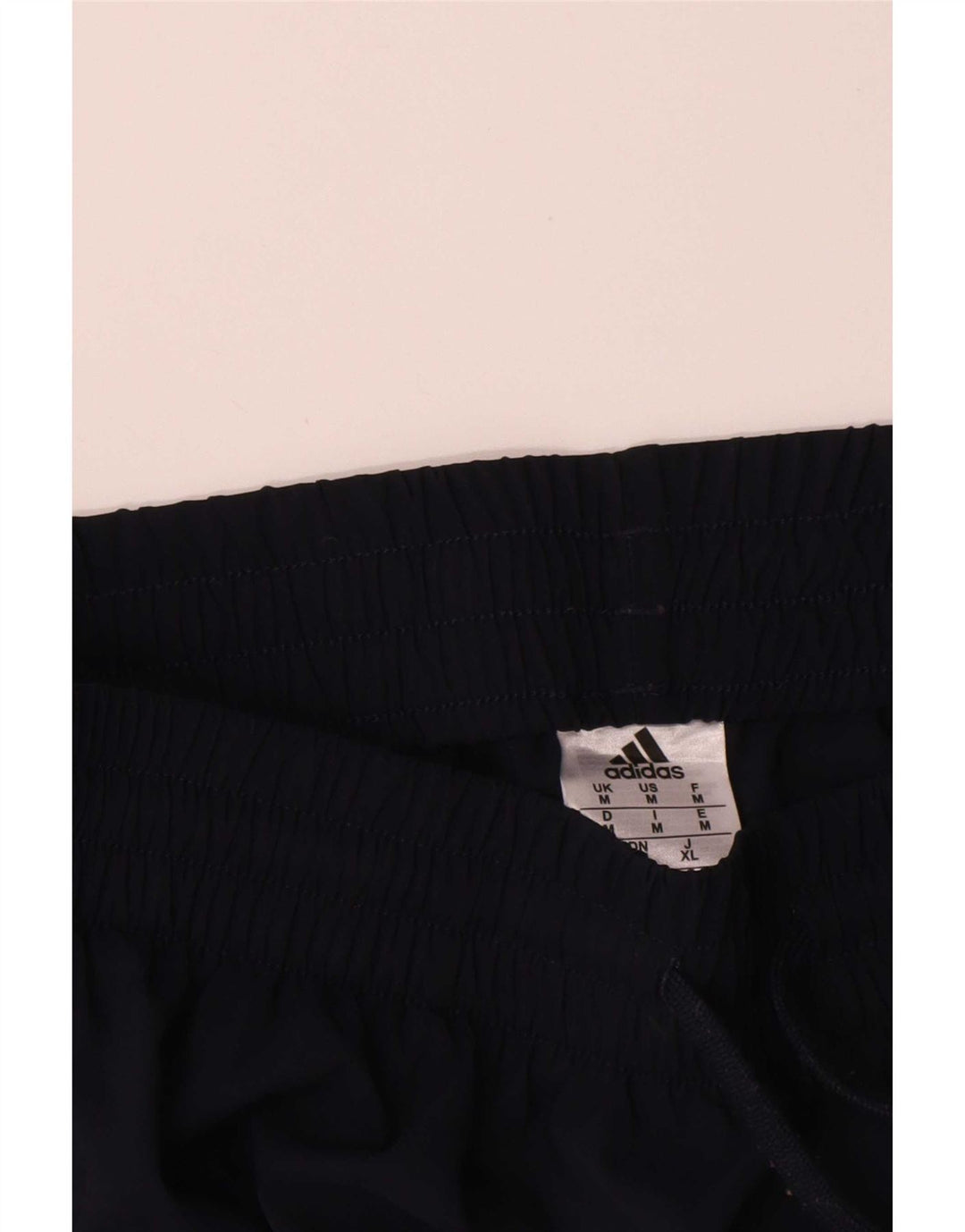 Pantaloni da tuta da uomo Adidas medi in poliestere blu navy