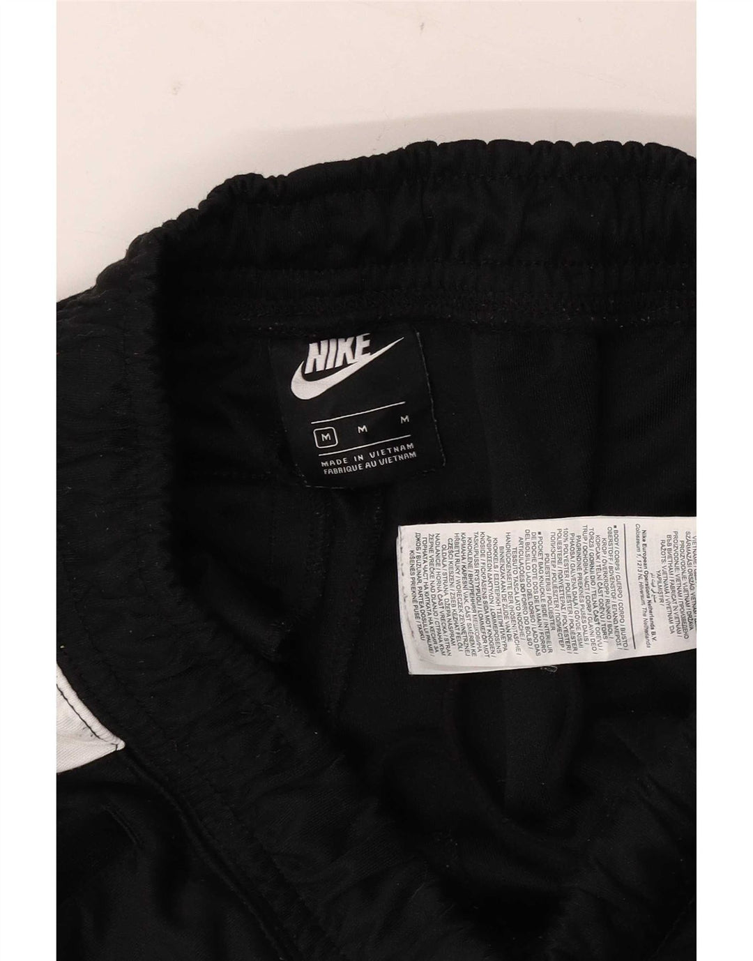 Pantaloni da tuta Nike Dri Fit da uomo, poliestere color block medio nero