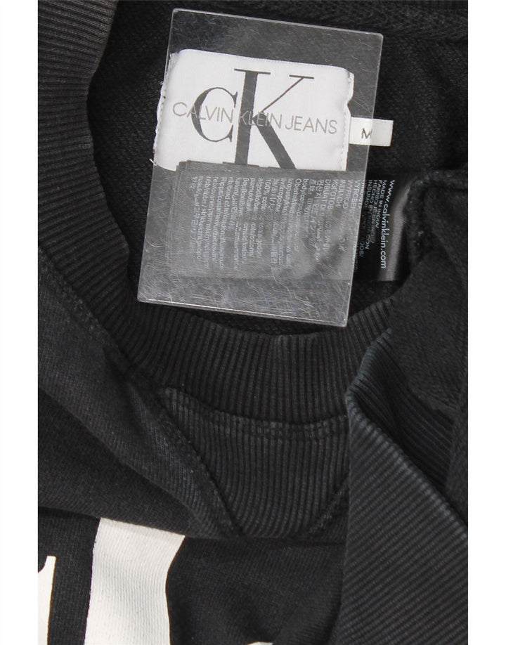 CALVIN KLEIN JEANS Mens Graphic Sweatshirt Jumper Medium Black Cotton Vintage Calvin Klein Jeans and Second-Hand Calvin Klein Jeans from Messina Hembry 
